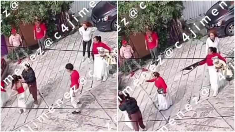 Salió señora a hacerla de “borlote” con bebé en brazos y arma larga