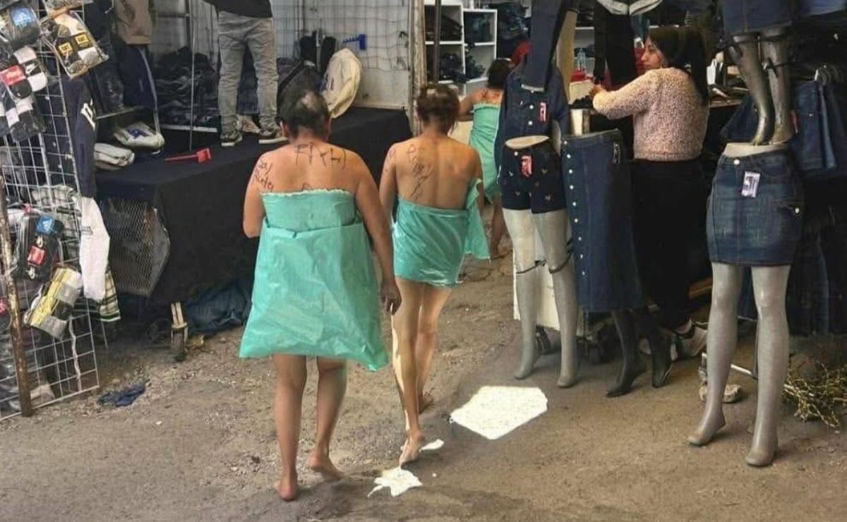 Rapan y desnudan a tres mujeres en tianguis de Puebla, ¿por qué?