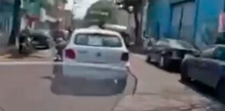 Taxista arrastra a policía para evitar alcoholímetro en Iztapalapa; ya fue detenido